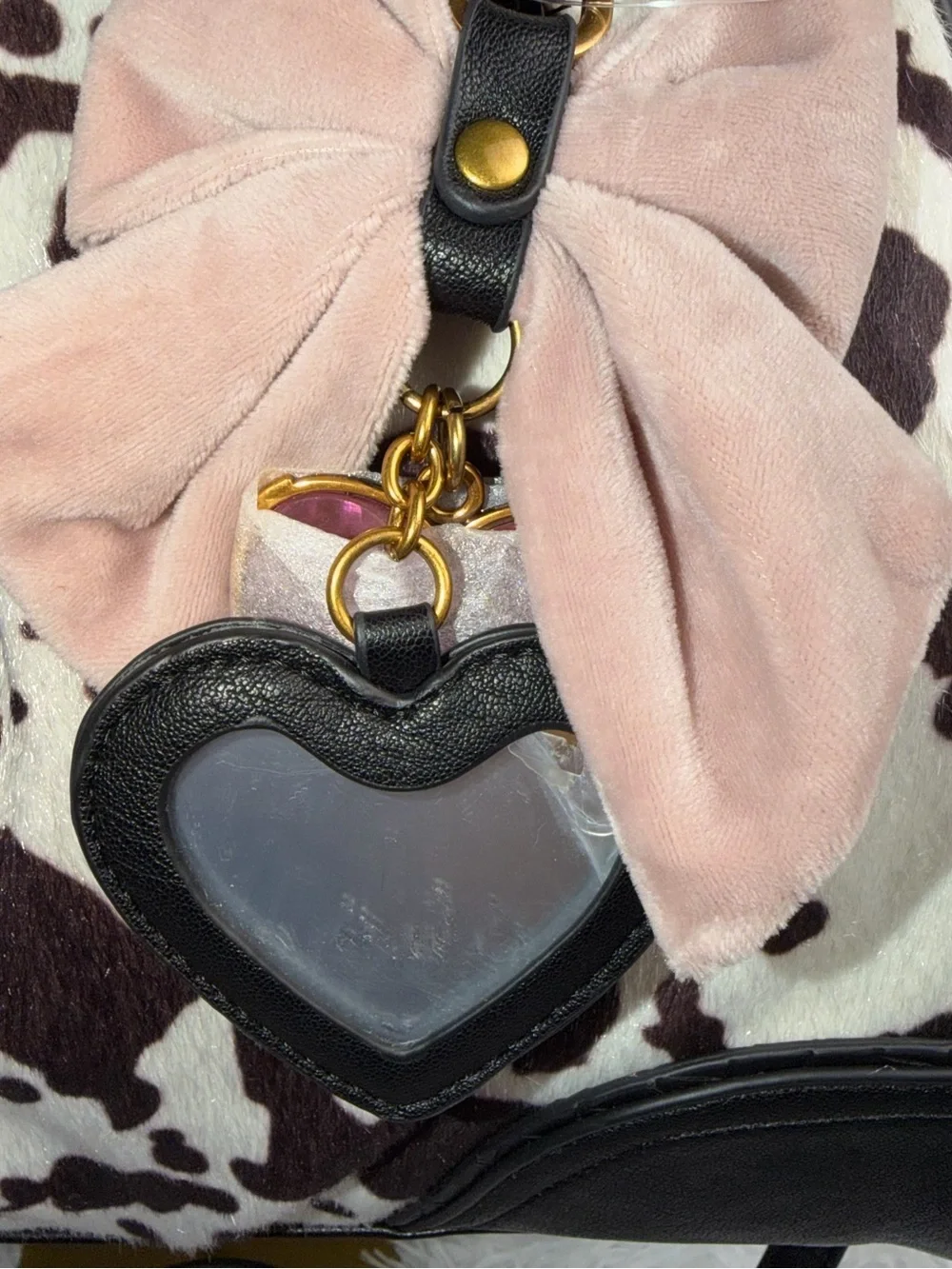 Juicy Couture Black & White Cow Print Satchel with Pink Bow Charm